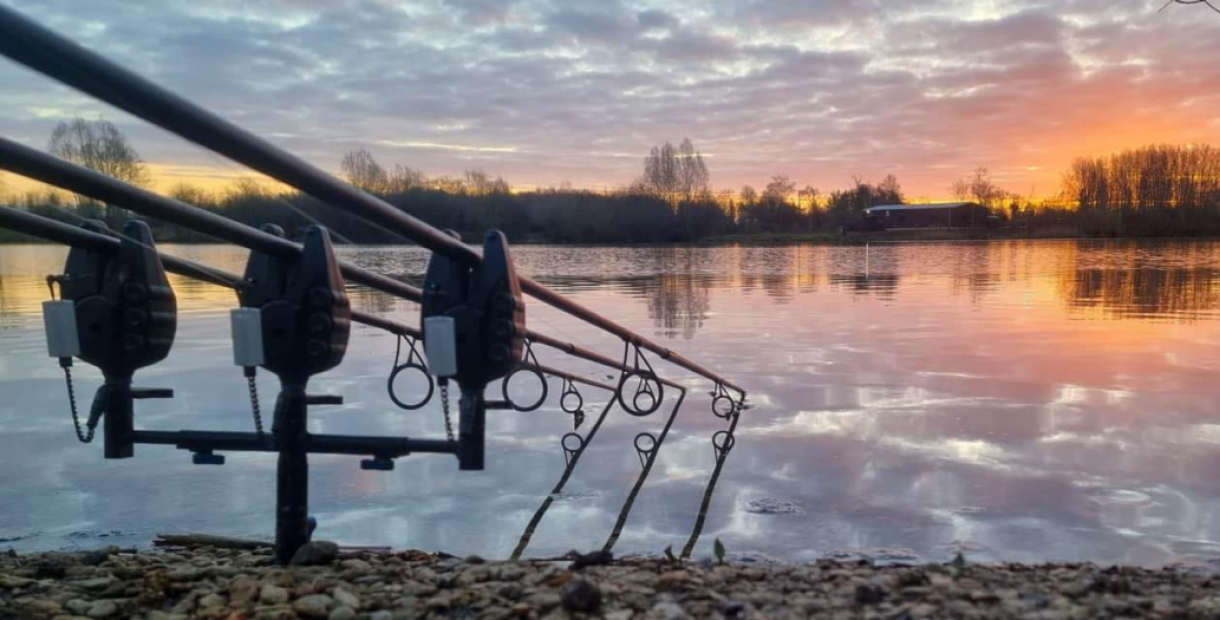 Image of some rods in the water at Linear Fisheries